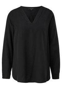 Blusa nera con maniche lunghe, scollatura a V, dalla texture liscia, vestibilità morbida e dettagli di cucitura sottili lungo il collo e le maniche.