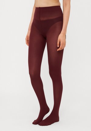 Burgundy strumpbyxor med en genomskinlig finish och hög midja; slät textur, helängd täckning och tåfri skärning vid anklarna.