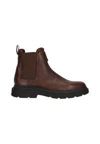 Bruine leren Chelsea-boot met elastische zijpanelen, ronde neus, gestructureerd oppervlak en een dikke zwarte rubberen zool voor grip.