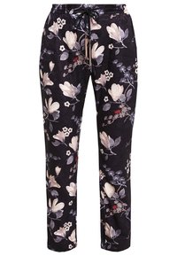 Pantalon noir à cordon de serrage avec un motif floral blanc et gris et des feuilles vert clair dispersées, présenté de face sur un fond uni.