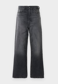 Dark gray wide-leg jeans made of denim, featuring a high waist, front pockets, and a classic button-fly closure. Subtle fading visible.