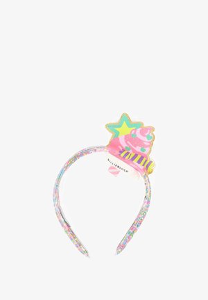 Cinta para la cabeza con confites de colores encerrados en plástico transparente y una decoración superior con cupcake rosa, estrella amarilla y rayas moradas.