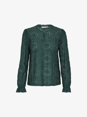 Groene kanten blouse met lange mouwen, een ronde halslijn, keyhole-detail en gerimpelde manchetten; bevat bloem- en geometrische patronen.