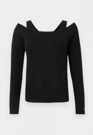 Haut noir à manches longues et épaules dénudées avec bretelles noires visibles sur les épaules, design uni, coupe ajustée.