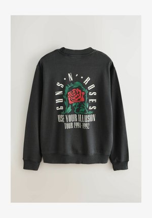 Juodas džemperis su raudona rože ir žaliais lapais, ant nugaros tekstas "Guns N' Roses" ir "Use Your Illusion Tour 1991-1992".