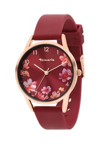 Rote Silikonarmbanduhr mit Zifferblatt im Blumenmuster. Gehäuse und Stundenmarkierungen in goldfarbener Ausführung, mit minimalistischem Design und Quarzwerk.