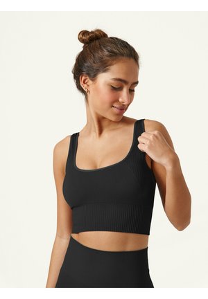 Top da allenamento nero a coste con scollatura quadrata e spalline larghe, caratterizzato da tessuto testurizzato e design aderente per comfort e supporto.