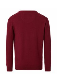 Burgunderfarbener Pullover mit langen Ärmeln, Rundhalsausschnitt und geripptem Saum. Hergestellt aus einem weichen, gestrickten Material, mit nahtlosem Schulterdesign.