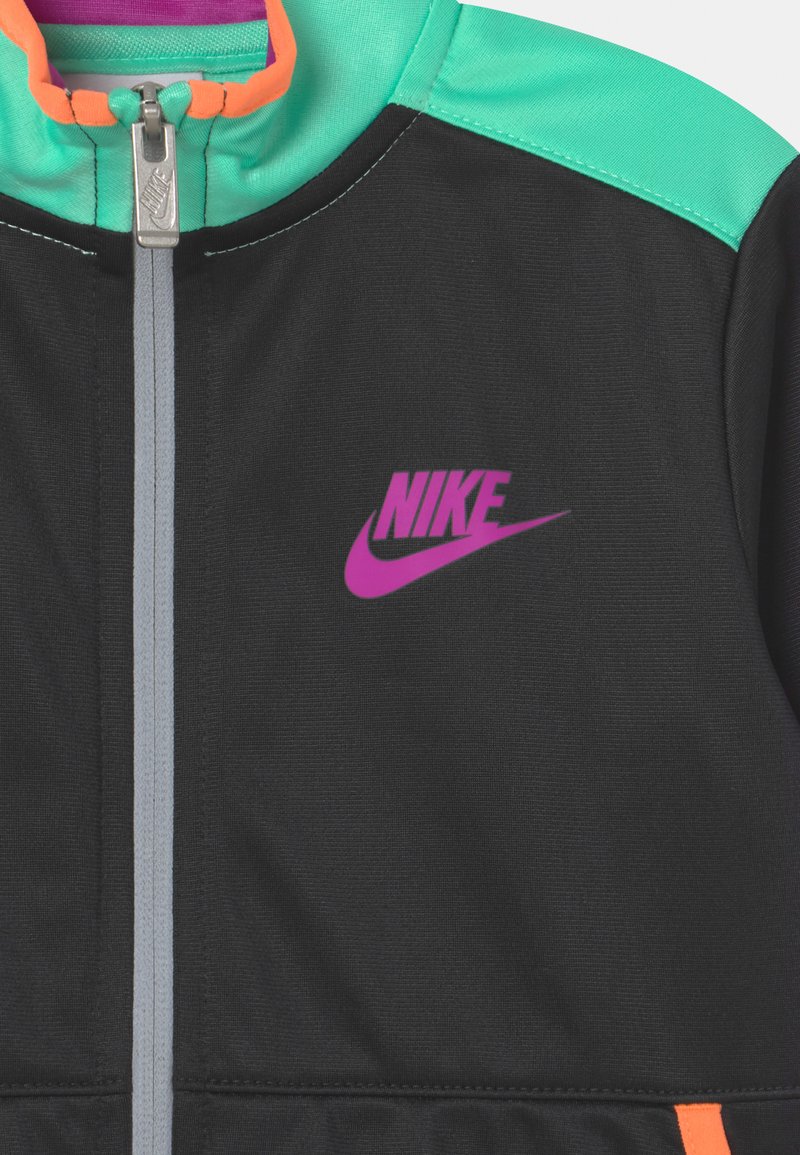 nike 98 tribute jacket in black