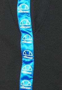 Ellesse Teplákové kalhoty - black