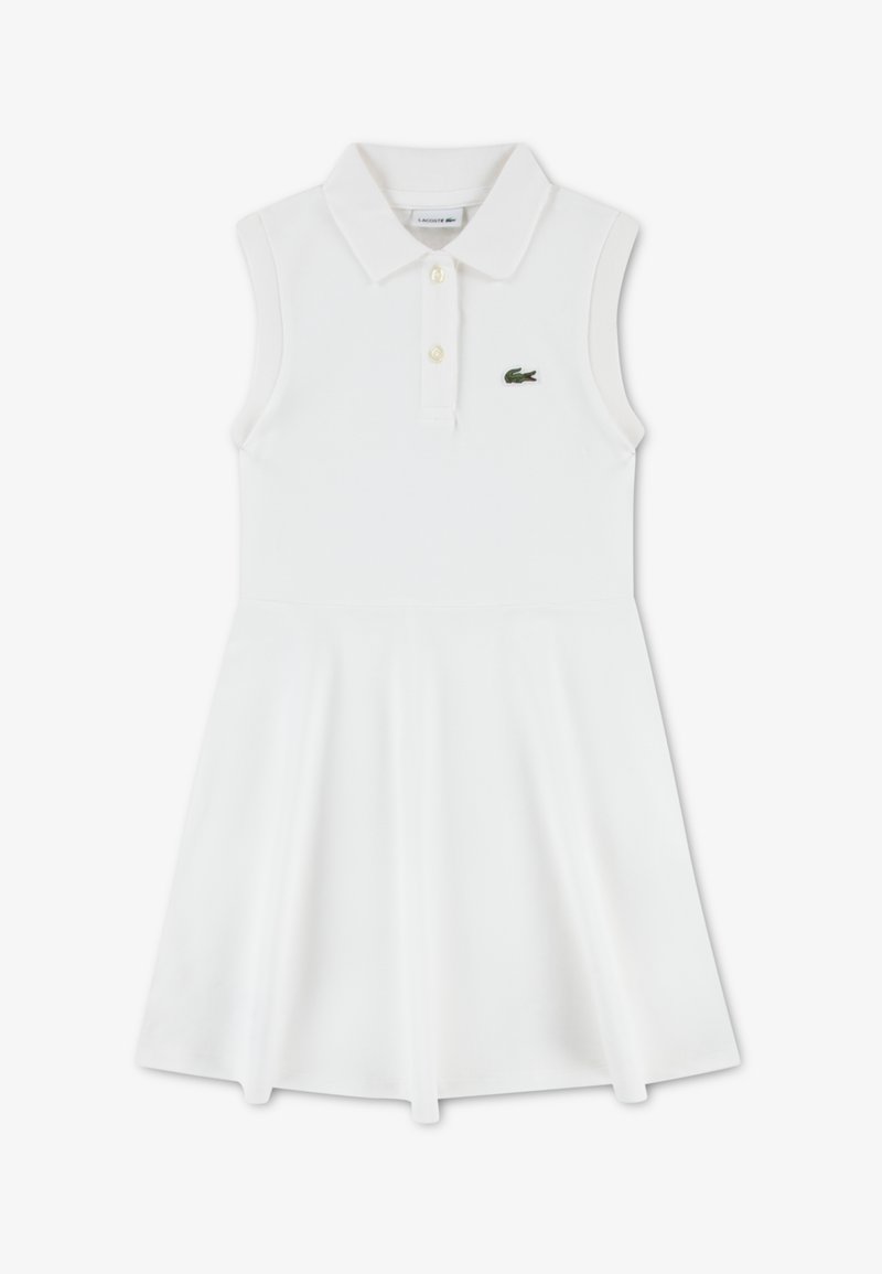 Λευκό αμάνικο φόρεμα με γιακά πόλο, με πατιλέτα με κουμπιά και πράσινο λογότυπο Lacoste στο στήθος. Λείο, ελαστικό ύφασμα.