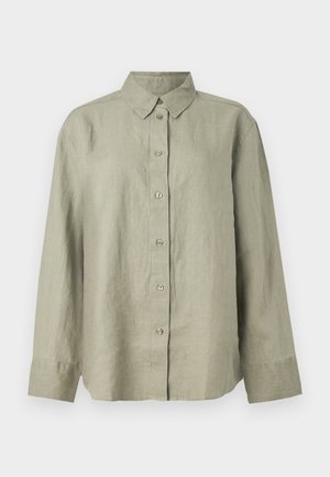 Light green linen button-up shirt with a collar, long sleeves, and front placket featuring six buttons. Soft texture and relaxed fit.