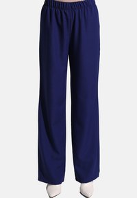 Pantaloni a gamba larga blu navy con elastico in vita, realizzati in un tessuto liscio che drappeggia dolcemente, con una vestibilità dritta e senza tasche.