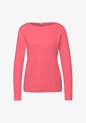 Bluzka z długim rękawem w żywym kolorze koralowym, z okrągłym dekoltem i gładkiej, elastycznej bawełnianej tkaniny. Prosty design, bez wzorów i dodatków.