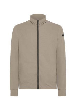 Giacca beige con zip alta, due tasche laterali e zip nera. Presenta maniche lunghe e un design minimalista.