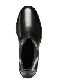 Bottine en cuir noir avec une finition lisse, panneaux élastiques sur les côtés et bout rond. Présente une semelle extérieure texturée et une couture contrastante.