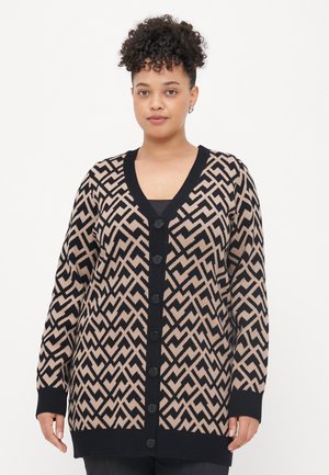Long cardigan featuring a zigzag pattern in black and beige, with a V-neck, button front, and ribbed cuffs and hem.