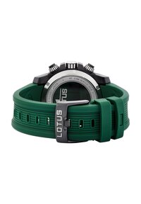 Reloj con correa de silicona verde que presenta una caja redonda negra, acentos plateados y una parte trasera transparente. Resistente al agua hasta 10 ATM.