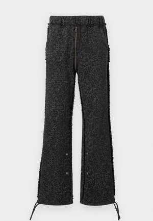 Atelier de roupa FLAWED PANTS UNISEX - Pantalones deportivos - black