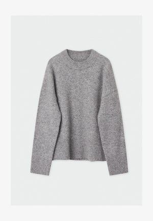 Szary wełniany sweter z okrągłym dekoltem, opuszczonymi ramionami i ściągaczem na dole. Miękka tekstura o minimalistycznym designie, bez wzorów czy ozdób.