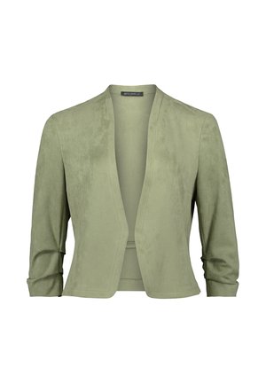 Veste légère en suède vert, avec un devant drapé ouvert, des manches trois-quarts et une texture lisse. Sans fermetures ni ornements.