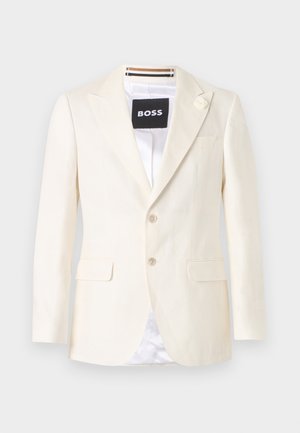 Kreemivärvi kohandatud bleiser sälkidega kraega, kahe esikäepidemega tasku, kahe nupuga ja väikese lilledega detail vasakul krael.