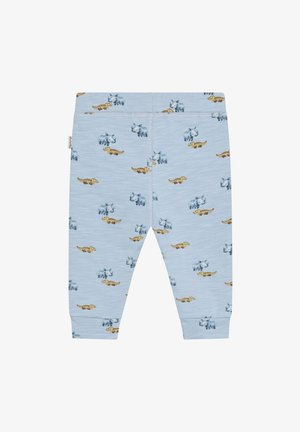 Hellblaue Baumwoll-Leggings mit einem verspielten Muster aus bunten Cartoon-Dinosauriern, mit einer weichen, glatten Textur.