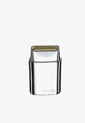 Compact zilveren elektrische scheerapparaat met gouden folie kop en BaBylissPRO 4Artists-logo aan de voorkant.