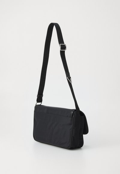 Black rectangular shoulder bag with adjustable strap and flap closure, displayed against a plain light background.