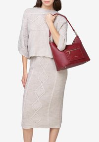 Miriade NAXI - Borsa a mano - rosso