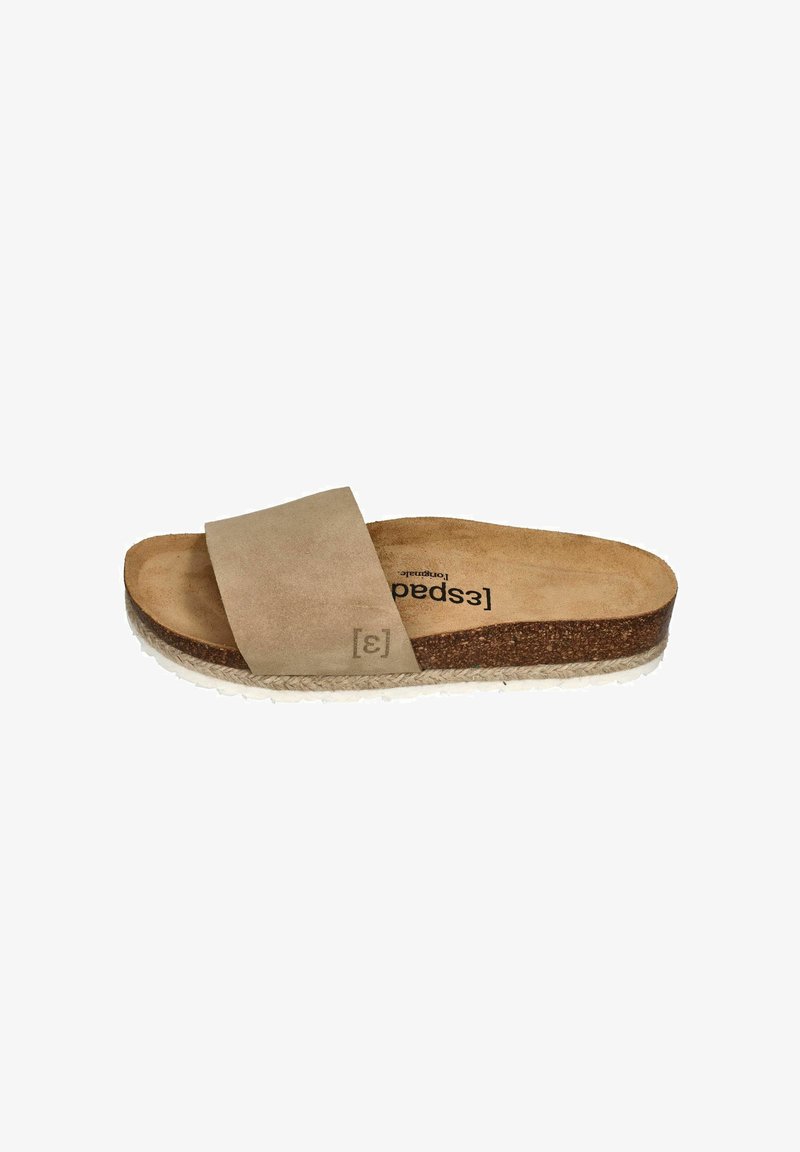 Beige suede slide sandal with cork footbed, thick strap, and textured rubber sole. Minimalistic design with a natural finish.