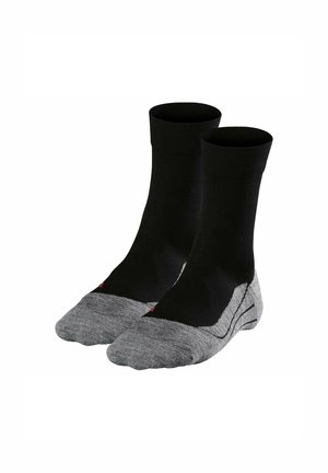 Black ankle socks with a grey reinforced toe and heel. Made from a soft material with ribbed cuffs for a snug fit.