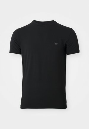 Zwarte crew neck T-shirt van zacht stof, met korte mouwen en een klein logo-accent op de linkerborst. Klassieke pasvorm.