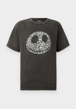 Black short-sleeve t-shirt with a circular graphic made of multiple small white skull faces on the chest.