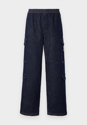 Dark blue denim cargo pants with a relaxed fit, featuring an elastic waistband, side pockets, and contrasting stitching details.