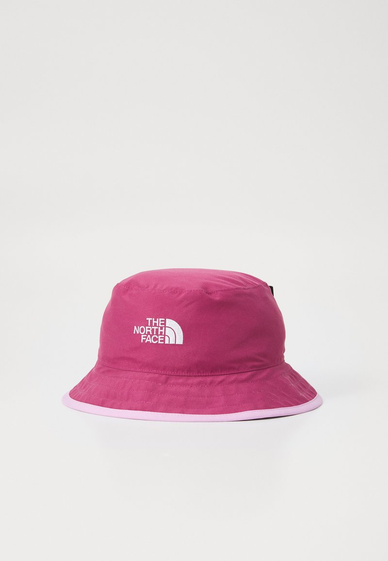 Rosa bucket hat i mjukt tyg med en kontrasterande ljusrosa kant på brätten. Har "The North Face"-logotypen i vit broderi.