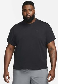 Nike Performance PRIMARY - Camiseta deportiva - black black