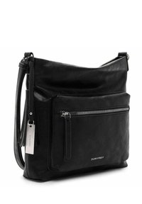 Černá syntetická kožená kabelka s přední kapsou na zip, nastavitelným popruhem a třásněmi. Na spodní straně má decentní logo.