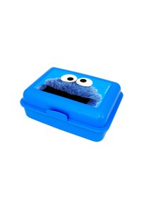 Lunch box blu con un design di personaggio caratterizzato da grandi occhi bianchi e un viso peloso blu testurizzato sul coperchio, realizzato in materiale plastico resistente.