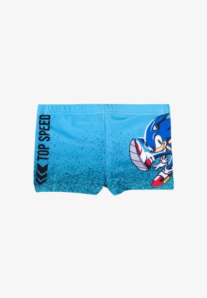 Blue swim shorts with a gradient pattern, featuring a Sonic character graphic. Black text “TOP SPEED” on the left side, and red accents on shoes.