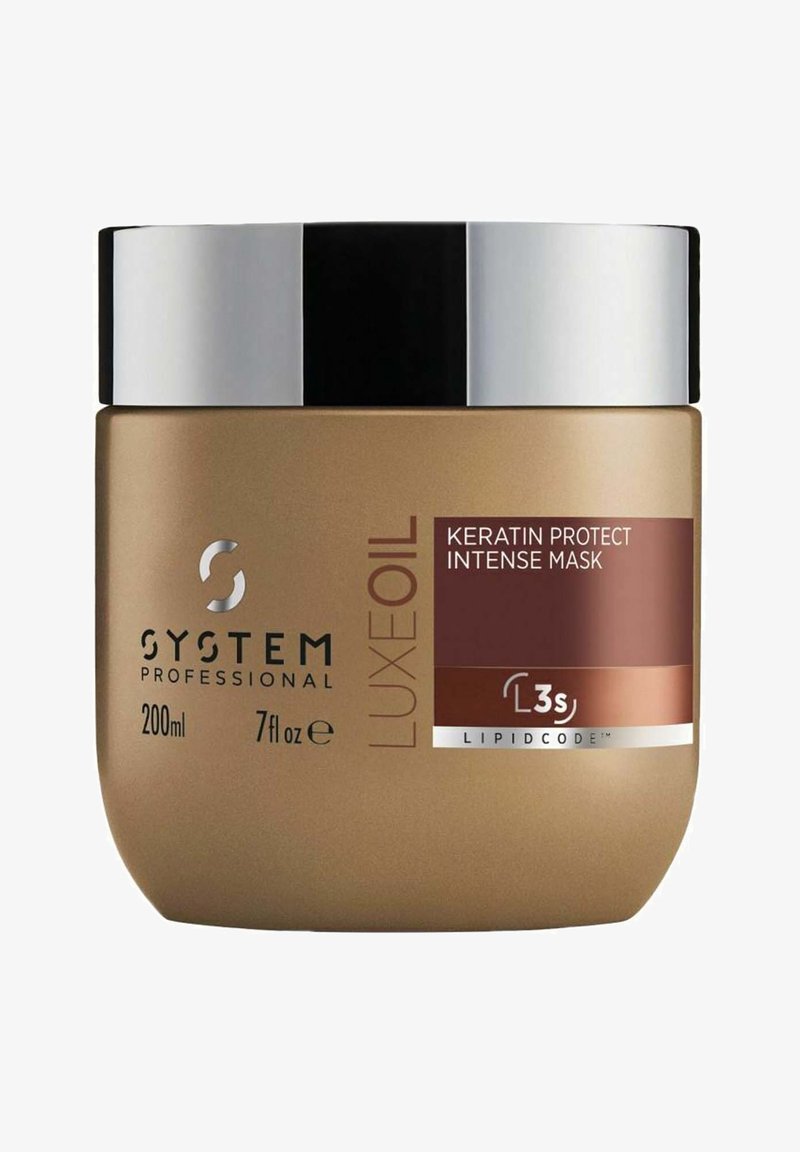 Gouden pot van System Professional Luxe Oil Keratin Protect Intense Mask, 200 ml. Glad metalen zwart deksel, rode en witte label met productdetails.
