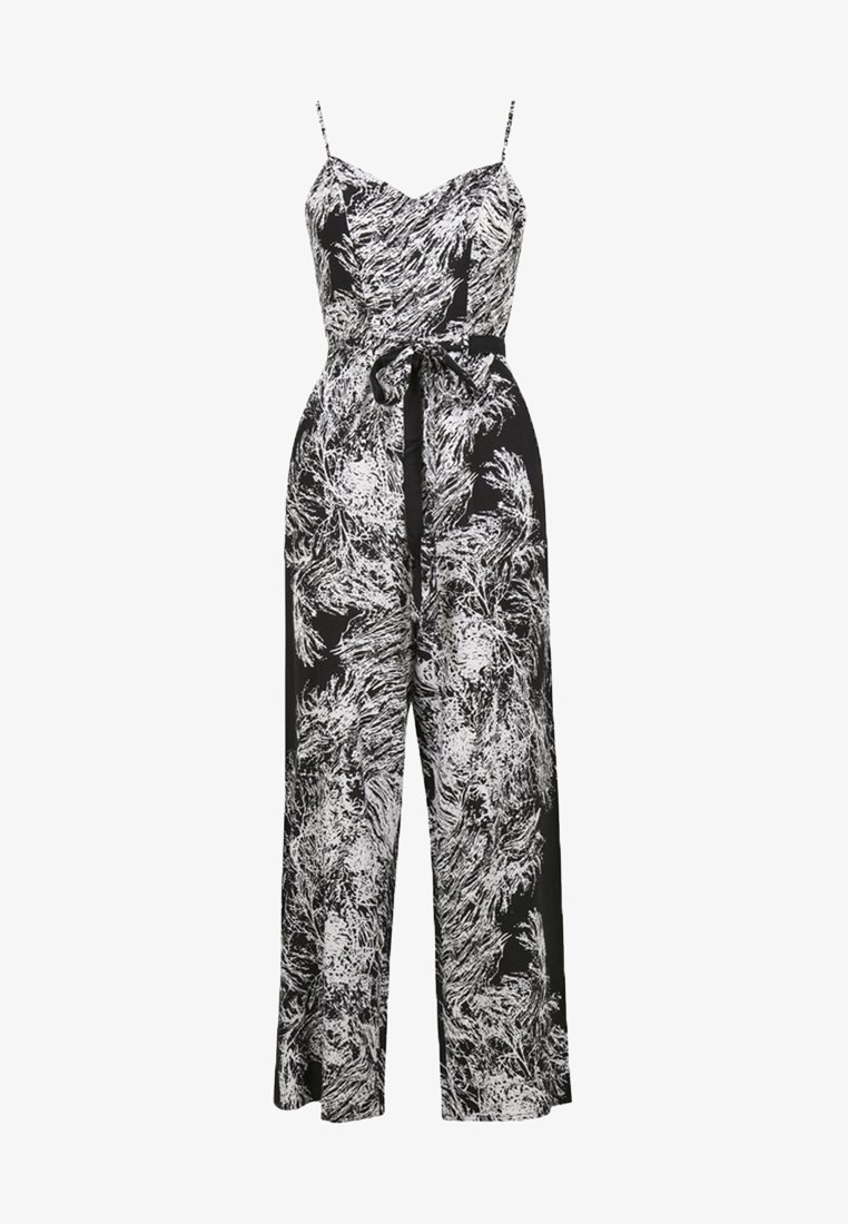 Black and white jumpsuit with spaghetti straps, featuring a floral pattern, a fitted bodice, and a tied belt at the waist. Loose, wide legs.