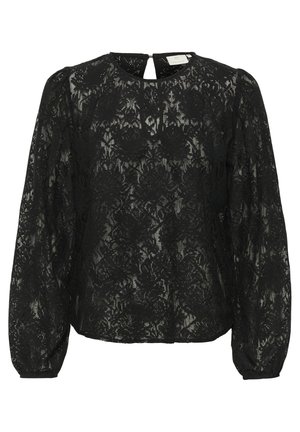Must mustriga blouse, mille pufferdat ja ümmarguse kaelusega, avaga seljal ja lillemustriga kogu pinnal.