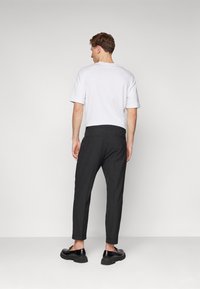 AllSaints DICE TALLIS TROUSER - Hlače - black