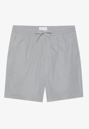 Gray shorts made of smooth, lightweight material with an elastic waistband, drawstring closure, and side pockets.