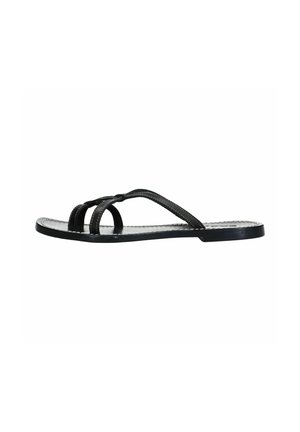Black flat sandals with a minimalistic design, featuring three overlapping straps with a smooth texture and a slim sole.