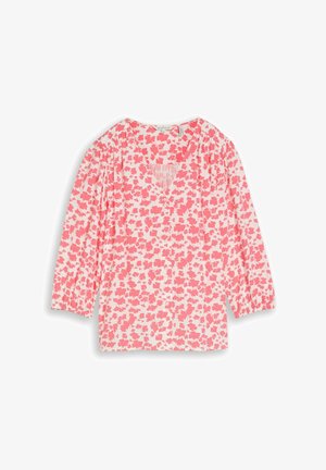 Langarmbluse mit elastischen Bündchen, V-Ausschnitt und rosa Blumenmuster auf weißem Hintergrund, flach liegend.