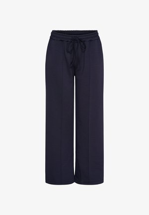 Marineblå viddebukser med elastisk talje og snøre foran, med en central søm ned langs hvert ben.