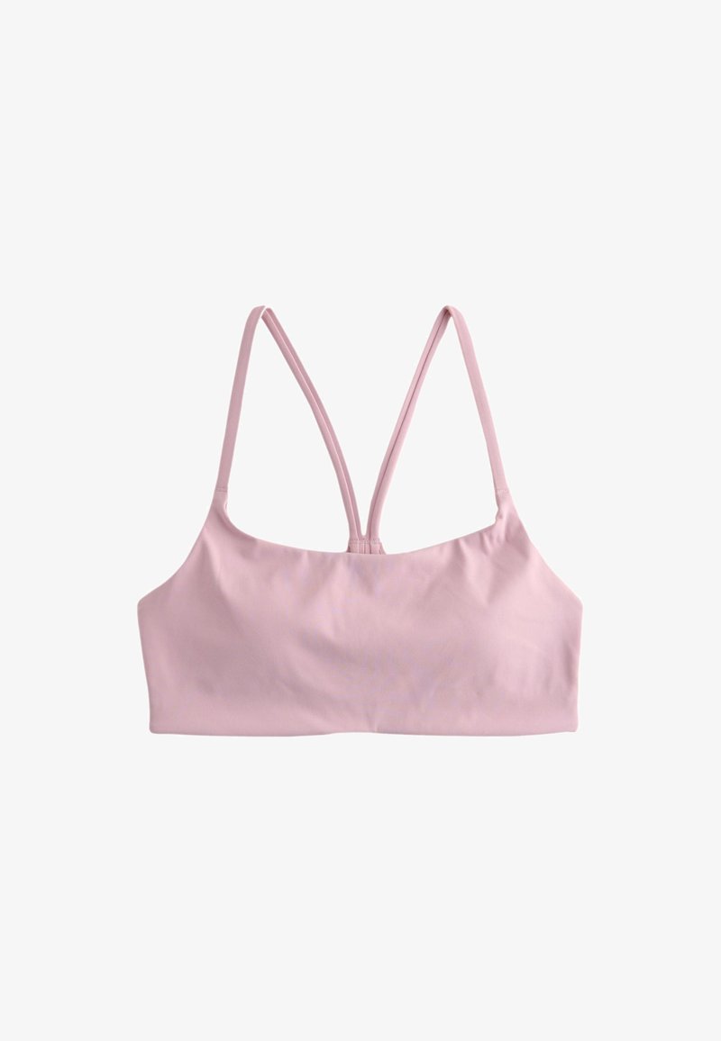 Reggiseno sportivo rosa chiaro con sottili doppie bretelle che formano una forma a V sulla schiena, progettato per attività a basso impatto.