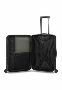 Valigia rigida nera con manico telescopico e quattro ruote. L'interno presenta una tasca a rete con cerniera e cinghie incrociate per fissare gli oggetti.